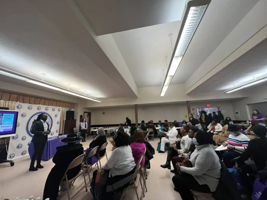 Attentive crowd at community information session