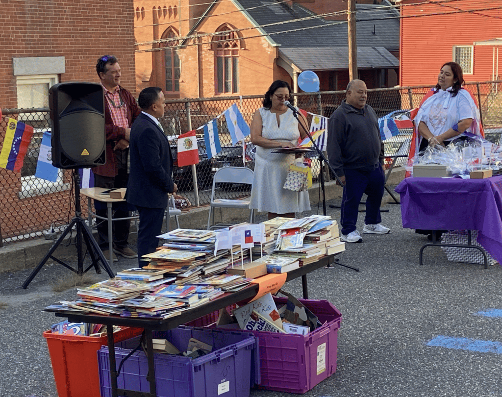 People gathered for a book donation event.