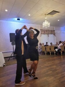 Couple dancing at a wedding reception.