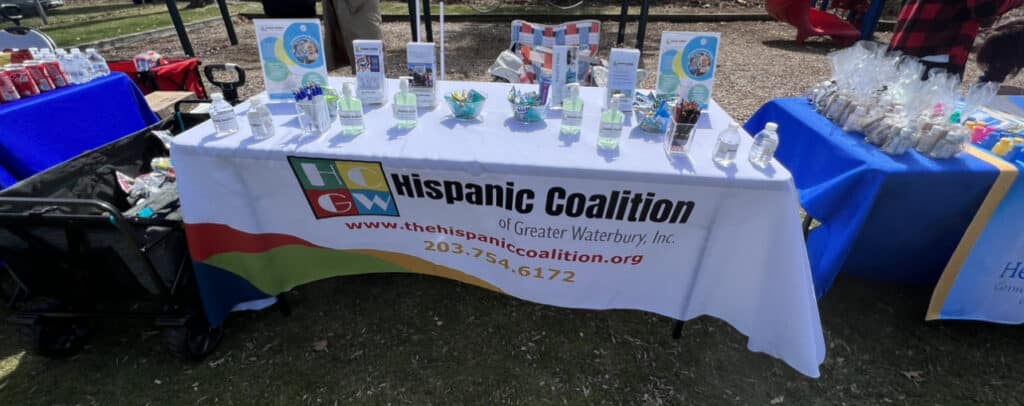 A table with several cups and plates on it.