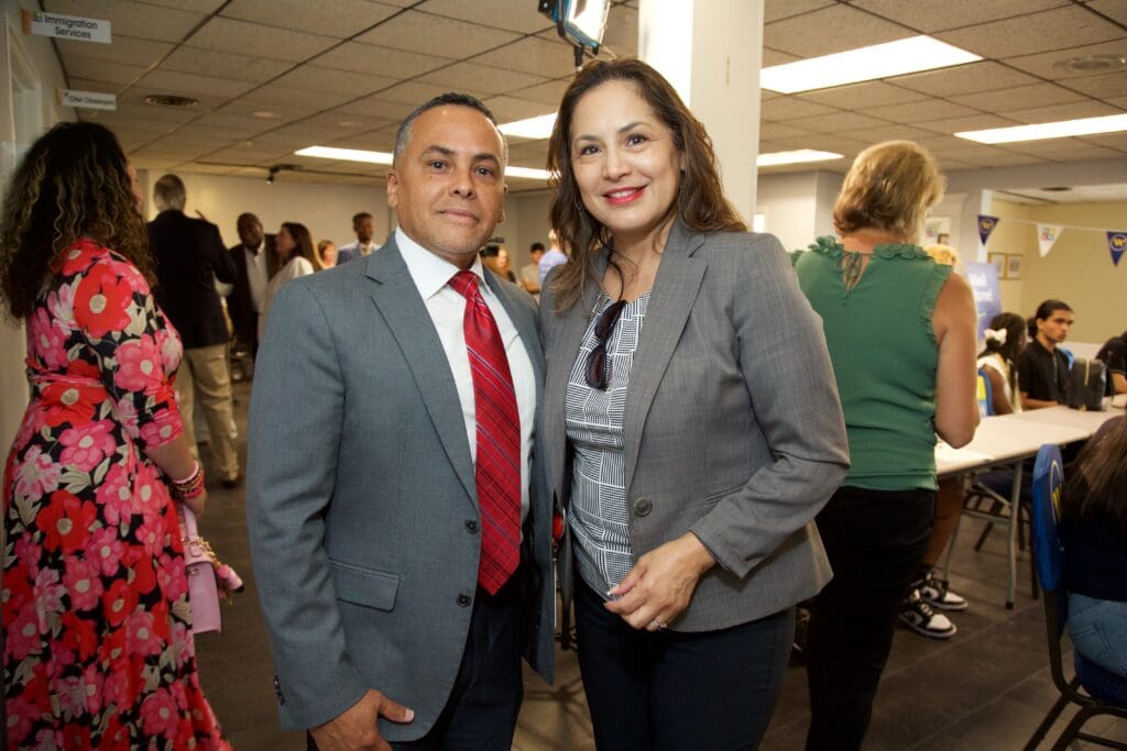 A man and woman posing for the camera.