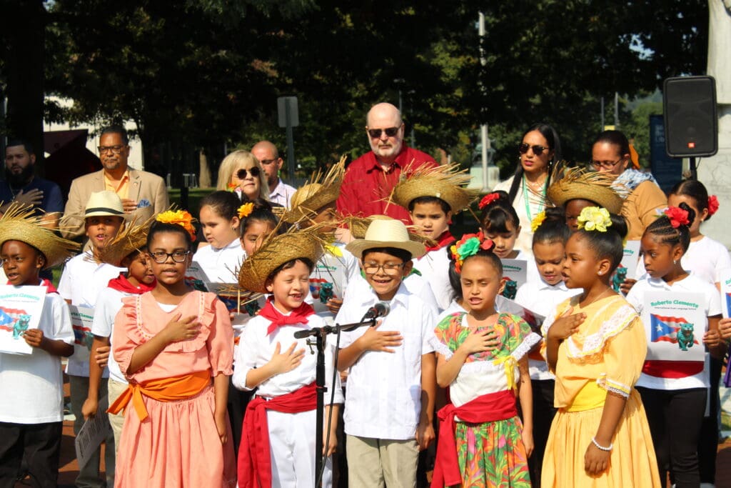 A group of children in costumes and hats.